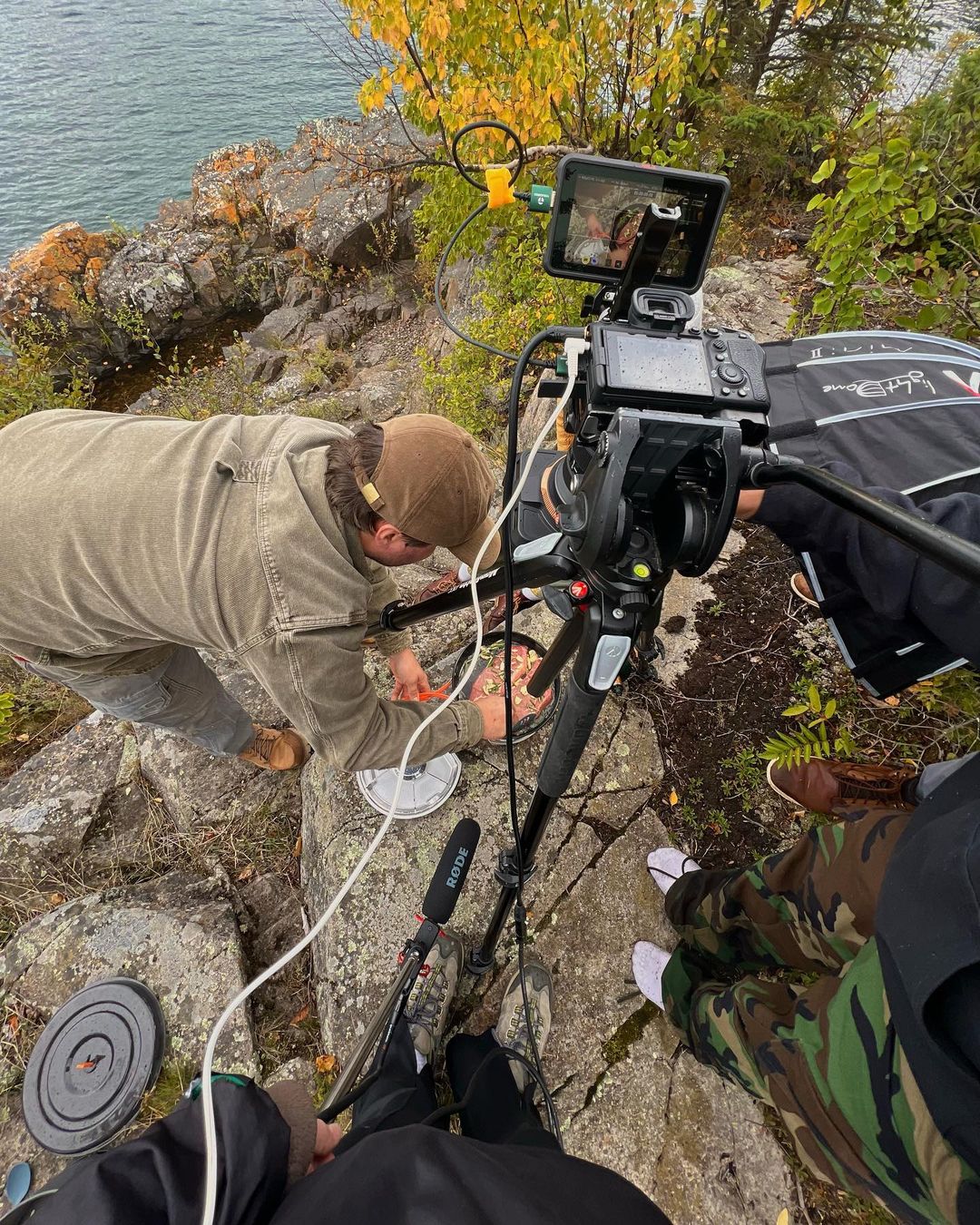 Video Crew shooting on rock