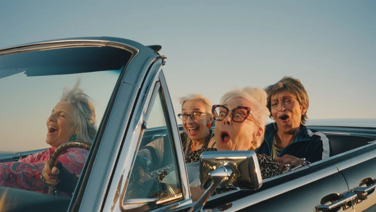 A family around a kitchen table, for the Whatever Comes Your Way Super Bowl commercial