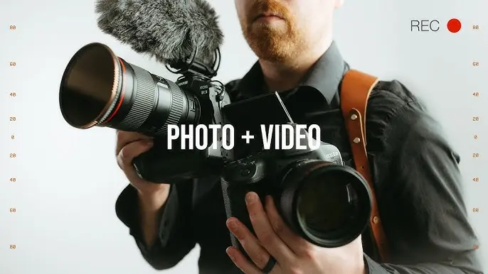 A camera on a tripod beside a lighting stand, for Minneapolis photo and video