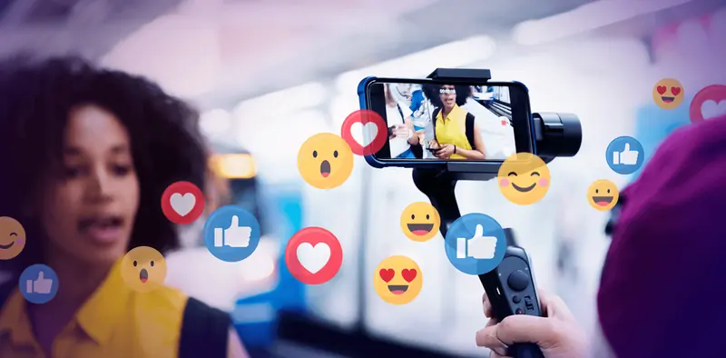 A hand holding a phone during a live stream